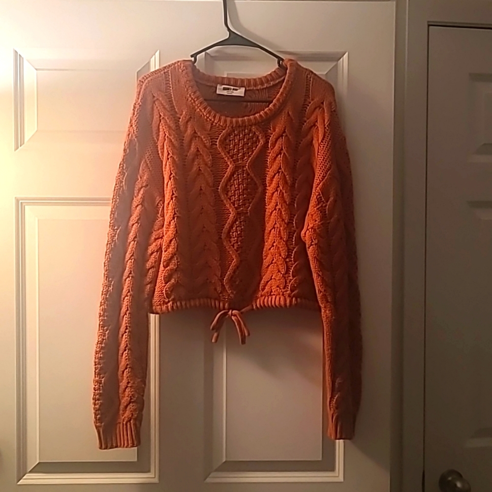 Cropped orange sweater